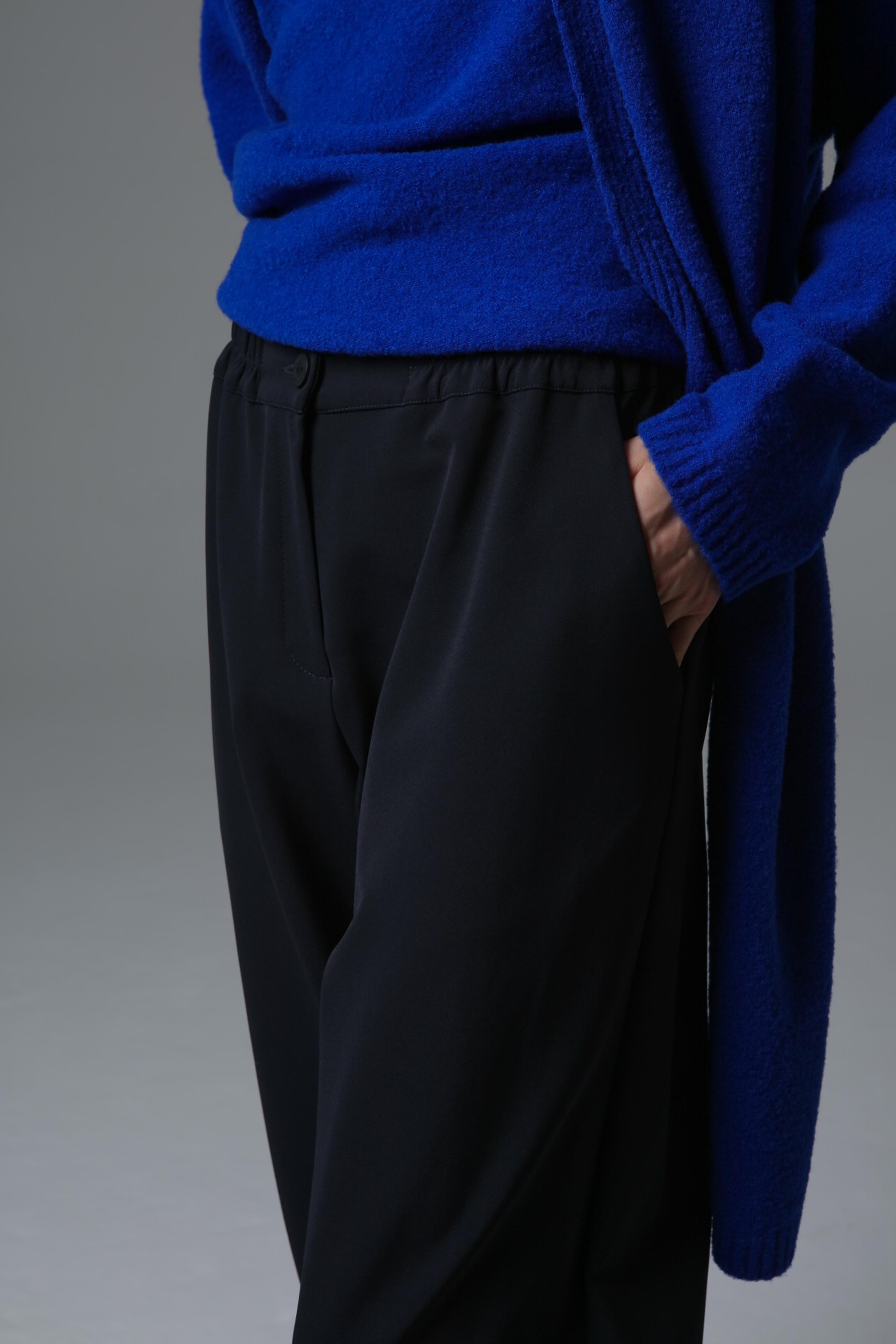 Брюки с защипами