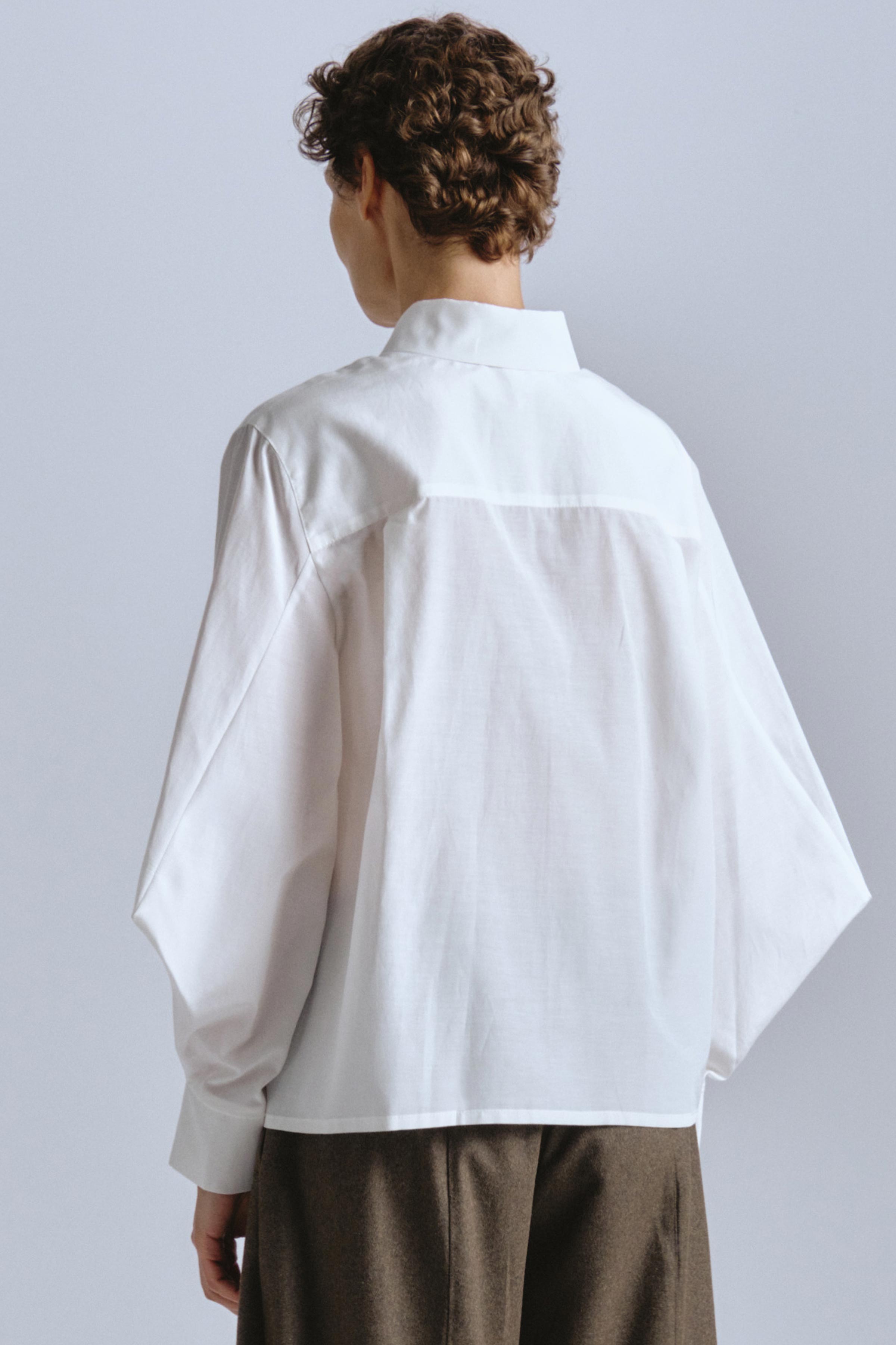 Блуза с ромбовидными рукавами