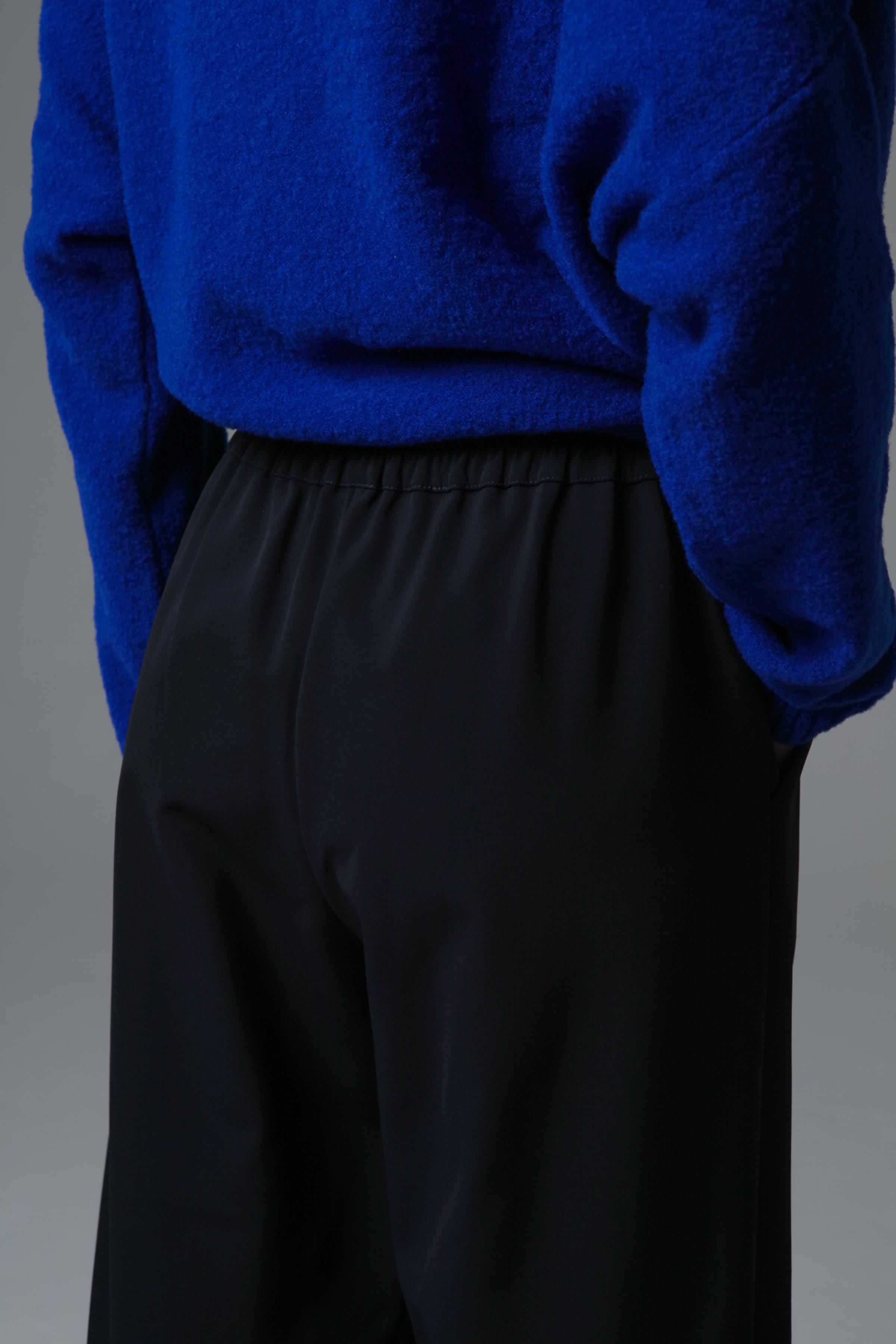 Брюки с защипами